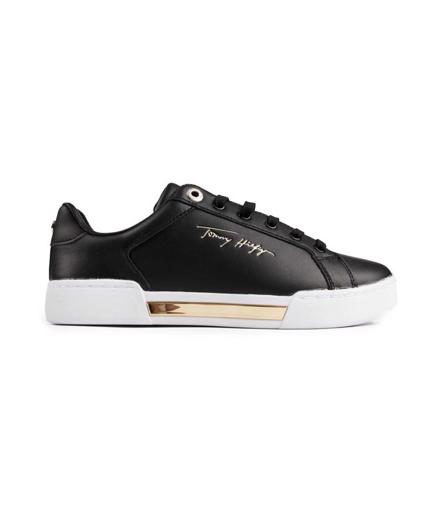 Womens black Tommy Hilfiger elevated sneaker trainers, manufactured with leather and a rubber sole. Featuring: gold hardware, engraved eyelet, tommy hilfiger signature branding and tongue/heel branding.