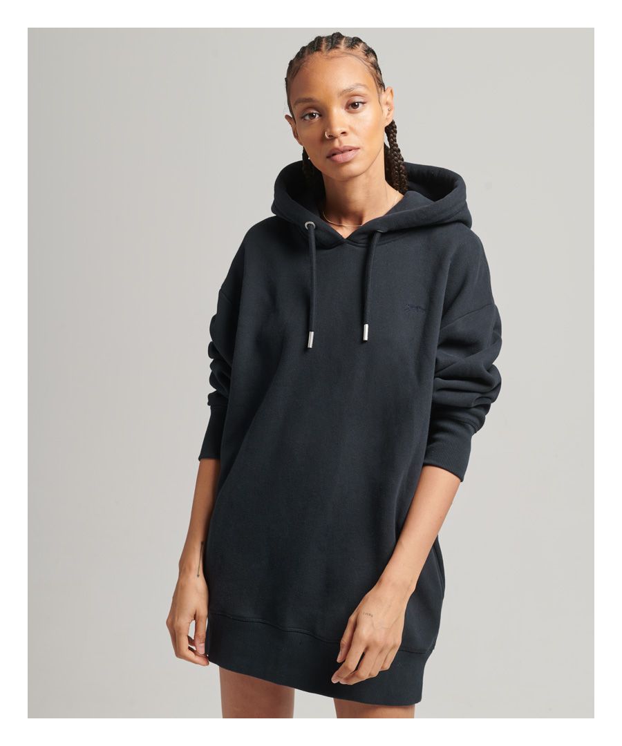 Staying cosy and keeping it stylish is the best way with the organic cotton embroidered logo sweat dress. Perfect for lounging around in and still turning heads, feeling as cosy as possible throughout the day.Oversized fit – exaggerated and super relaxed, let your style flowDrawstring hoodEmbroidered logoTwin side pocketsRibbed cuffs and hemBrushed liningSuperdry logo tabXS/S - UK 6-10, US 2-6, EU 34-38M/L - UK 12-16, US 8-12, EU 40-44Made using a blend of organic cotton and recycled polyester.Organic cotton is grown using natural rather than chemical pesticides and fertilisers. The healthier soil this creates uses significantly less water which is better for our planet and for the farmers who grow it.We use recycled materials from a number of sources to make our garments, giving discarded materials a new purpose, saving waste, and reducing the amount of carbon emitted in this garment’s production compared to conventional alternatives.