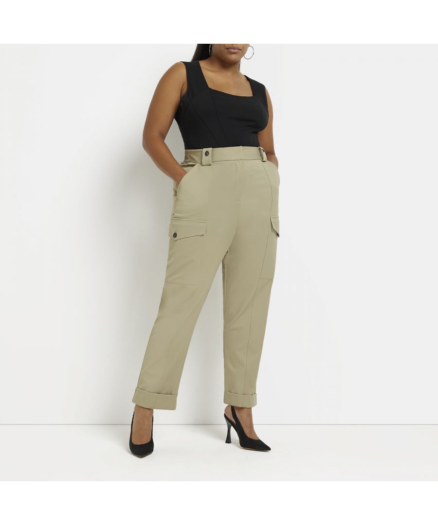 > Brand: River Island> Department: Women> Colour: Khaki> Type: Trousers> Style: Cargo> Material Composition: 89% Polyester 11% Elastane> Material: Polyester> Pattern: No Pattern> Occasion: Casual> Size Type: Plus> Season: AW22