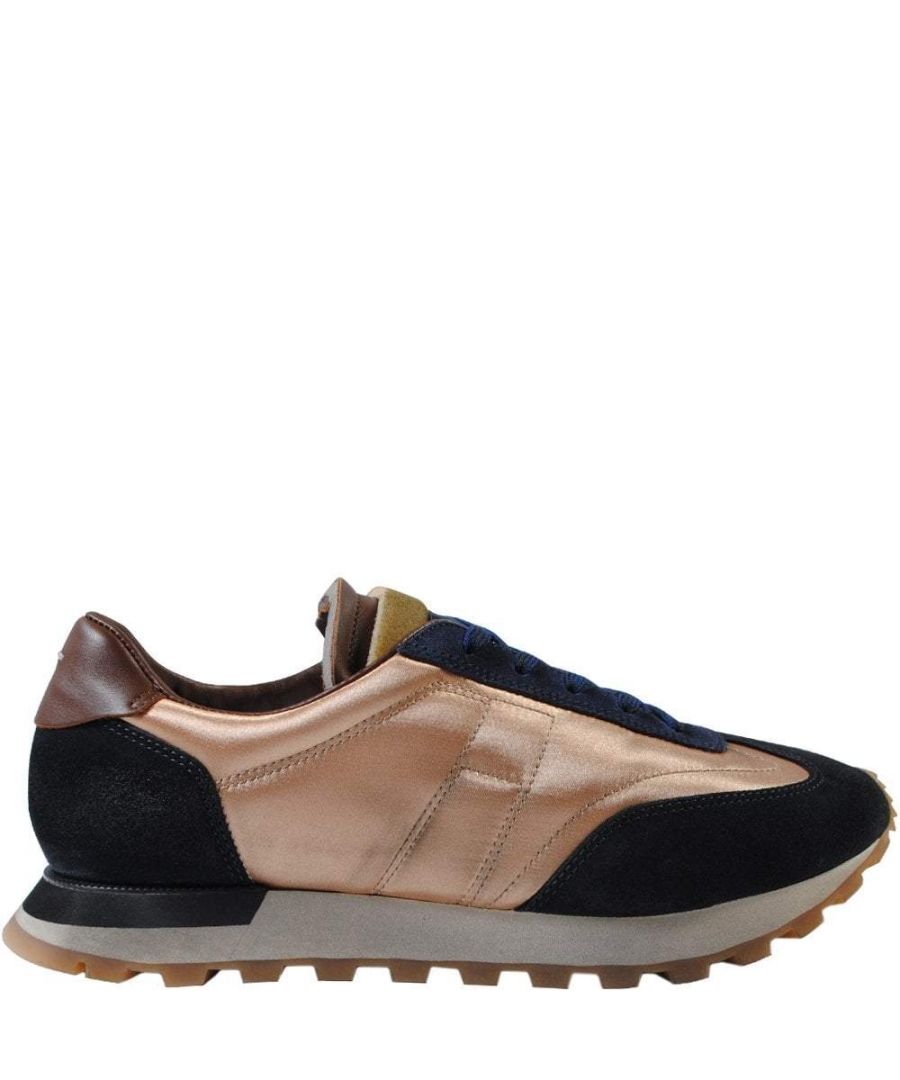 This Maison Margiela Retro Low Runner Trainers in Gold, have a full leather lining and features a high-shine gold nylon fabric with suede overlays, a two-layer tongue, extended rubber sole unit and are finished with a dirty treatment for a well-worn look.French fashion house Maison Margiela was founded in Paris in 1988 by Belgian designer Martin Margiela. A master of deconstructionism, Margiela earned global praise for his artsy,outlier designs that subvert classic tailoring techniques with reverse seams,recycled textiles,and industrial materials. Today,Creative Director John Galliano maintains these core foundations as he brings his signature over-the-top showmanship to the collection,creating transformative and exciting styles.