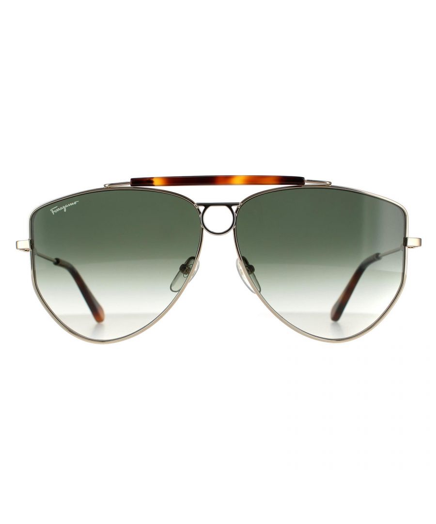 Salvatore Ferragamo Aviator Womens Gold Green Gradient Sunglasses SF241S are an aviator design crafted from lightweight metal. The double bridge, silicone nose pads and plastic temple tips ensure an all day snug fit. Slender temples are engraved with the Ferragamo logo for brand authenticity.