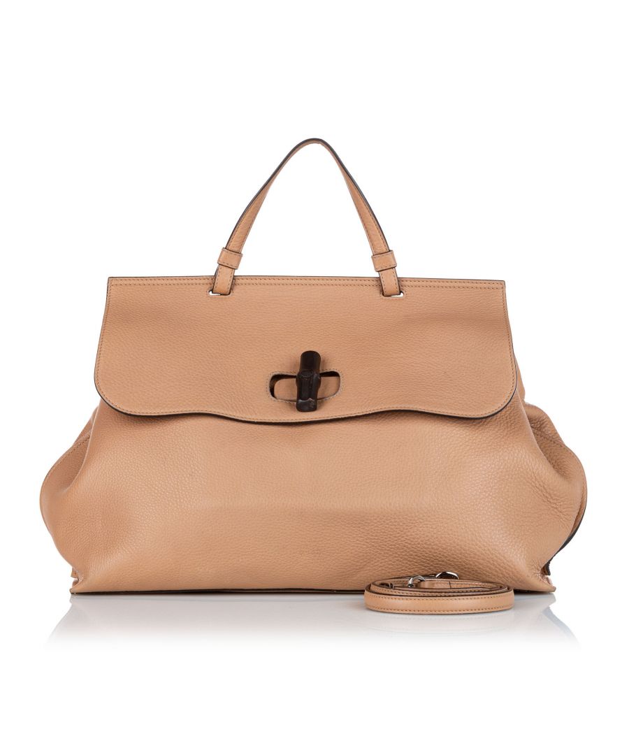 VINTAGE. RRP AS NEW. The Daily satchel features a leather body, a flat top handle, a detachable flat leather strap, a front flap with a bamboo bullet twist lock closure, and an interior zip and slip pockets.Exterior Front Discolored, Peeling. Exterior Back Out Of Shape. Exterior Botton Discolored. Exterior Handle Discolored. Exterior Corners Discolored, Peeling. Exterior Side Discolored, Out Of Shape. Exterior Front Discolored, Peeling. Exterior Back Out Of Shape. Exterior Botton Discolored. Exterior Handle Discolored. Exterior Corners Discolored, Peeling. Exterior Side Discolored, Out Of Shape. \n\nDimensions:\nLength 31cm\nWidth 40cm\nDepth 14cm\nHand Drop 12cm\nShoulder Drop 50cm\n\nOriginal Accessories: Shoulder Strap, Authenticity Card\n\nColor: Brown\nMaterial: Leather x Calf x Natural Material x Bamboo\nCountry of Origin: Italy\nBoutique Reference: SSU114132K1342\n\n\nProduct Rating: GoodCondition