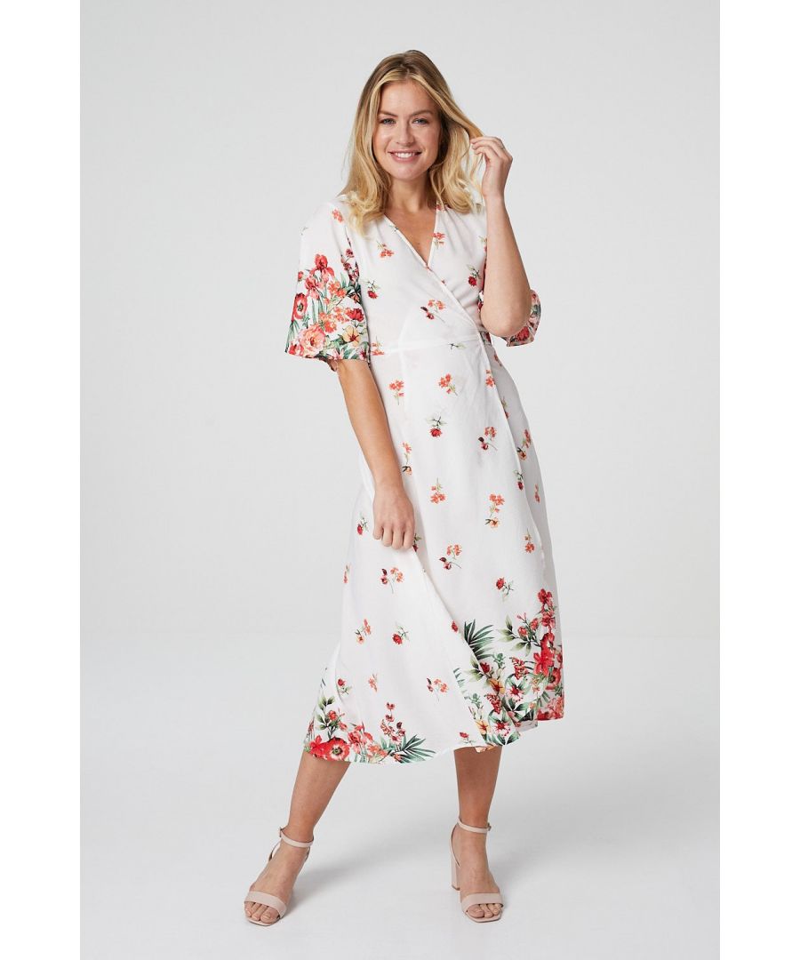 Every closet needs a bold floral wrap dress like this kimono sleeve style. With a v-neck, short sleeves, a wrap front and a tie detail fastening, sits below the knee. Pair with flat sandals for a holiday look or with nude heels for a dressed up wedding guest look.