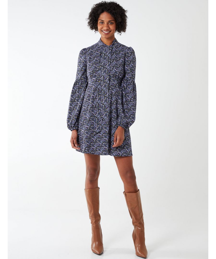 Get involved with this tie neck swing dress ideal for day to day wear. The pretty floral print and long sleeves are absolutely must have in your wardrobe! Wear it well with heels for a chic look., \n100% Polyester, Machine washable, Tie neckline, Long sleeve, Approx length 83 cm , Back zip fastened
