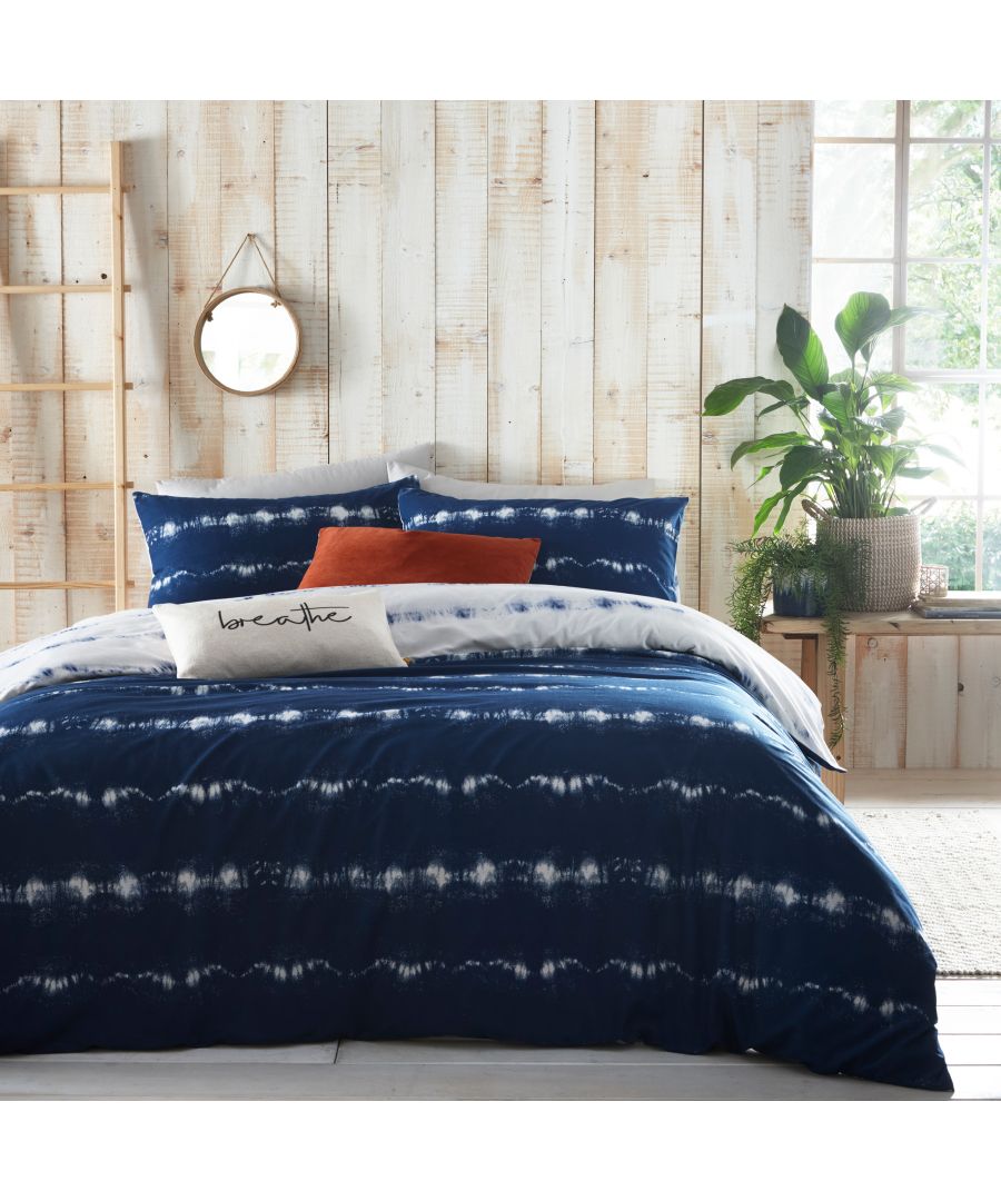 Add instant personality to your bedroom with this Tie Dye duvet and pillow case set. Featuring a vibrant indigo tie dye design. The colour continues to the reverse with a white and indigo tie dye design so you can switch the look when you need to.