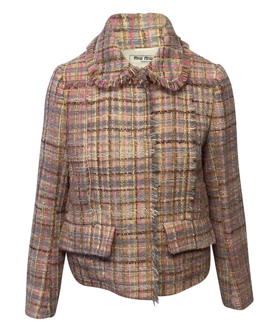 VINTAGE. RRP AS NEW. Prim and proper, this Miu Miu jacket will bring a girly finish to anything it's paired with. Crafted from pale pink wool and mohair-blend tweed with a lightweight feeling, it features slightly cropped sleeves that make it ideal for layering. Fraying trims down the front and around the collar add a casually refined touch. \n\nConcealed snap-buttoned front\nSide flap pockets 76% virgin wool, 21% mohair, 3% polyamide Partially lined\nLining: 100% polyester Sleeve lining: 56% acetate, 44% viscose\nDry clean\nDesigner colour name: Glicine\nMade in Italy\nTrue to size\nDesigned for a loose fit\nFalls to the hip \n\nMiu Miu Tweed Fringe Jacket in Multicolor Wool\nColor: multicolor\nMaterial: Wool/Hair | Lana vergine\nCondition: very good condition with light stains at the underarm lining\nSize: IT42/M\nSign of wear: No\nSKU: 81768   \nDimensions:  Length: 630 mm