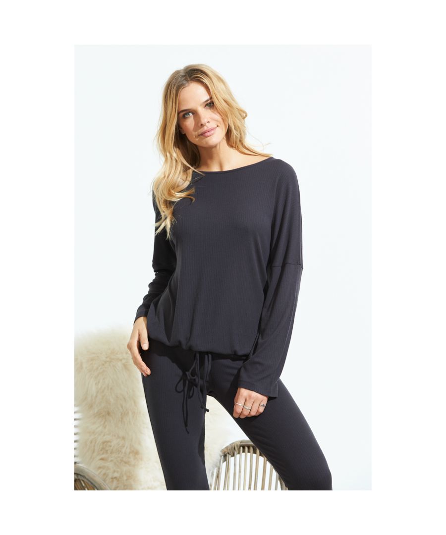 REASONS TO BUY: Lounge mode: ONMade from the softest jersey fabricOversized fit and drawstring waist for serious comfortChic boat neckDropped shoulder designMix and match with the coordinating leggings