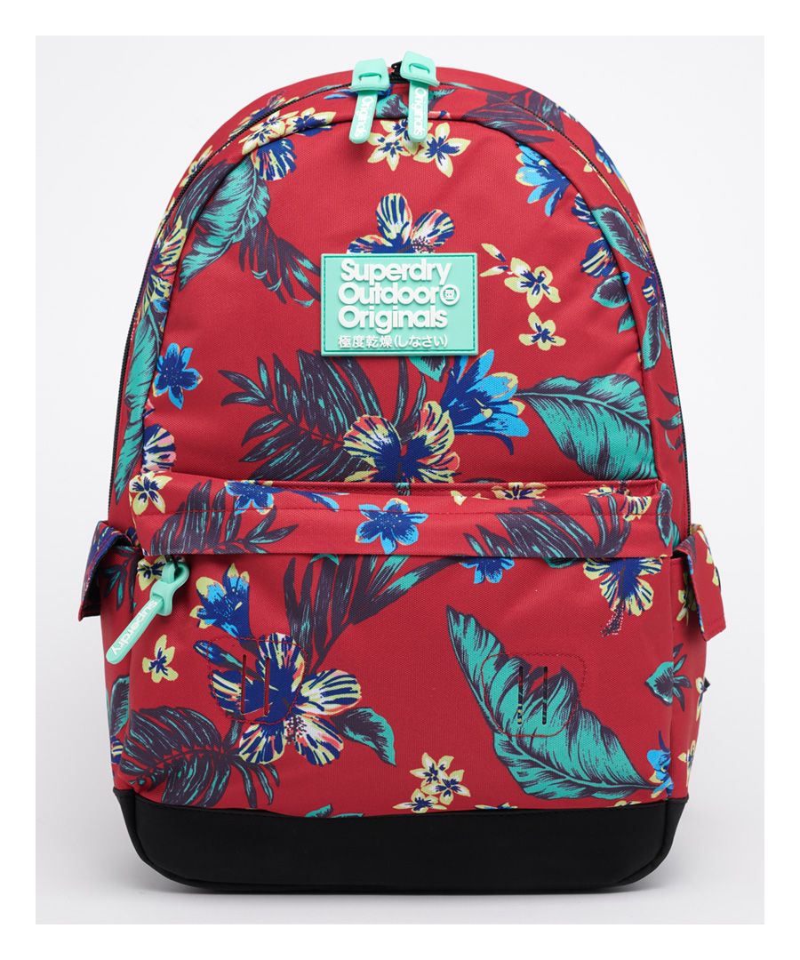 Bring Hawaii to you with this vibrant rucksack with an all over print. A great accessory for any season.Large main compartmentFront compartmentSide pocketsZip fasteningsPopper fasteningsAdjustable strapsGrab handleAnti-scuff panelAll over printRubber Superdry logosH 46cm x W 30.5cm x D 13.5cm