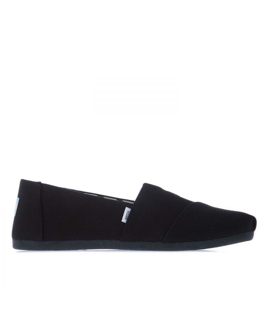 Womens Toms Recycled Cotton Canvas Alpargata Espadrille Pumps in black.- Recycled cotton upper  lining and sock-liner made with 50% recycled cotton.- Classic Alpargata design.- Toe-stitch and elastic V for easy on and off.- Chevron patterned canvas lining.- Custom insoles made with 50% eco content including recycled PU foam.- Direct injection outsole for flexibility and durability with tread pattern for improved traction.- Toms branding to side and back of heel.- 100% vegan construction.- Textile upper  Textile lining  Synthetic and textile sole.- Ref: 10017716