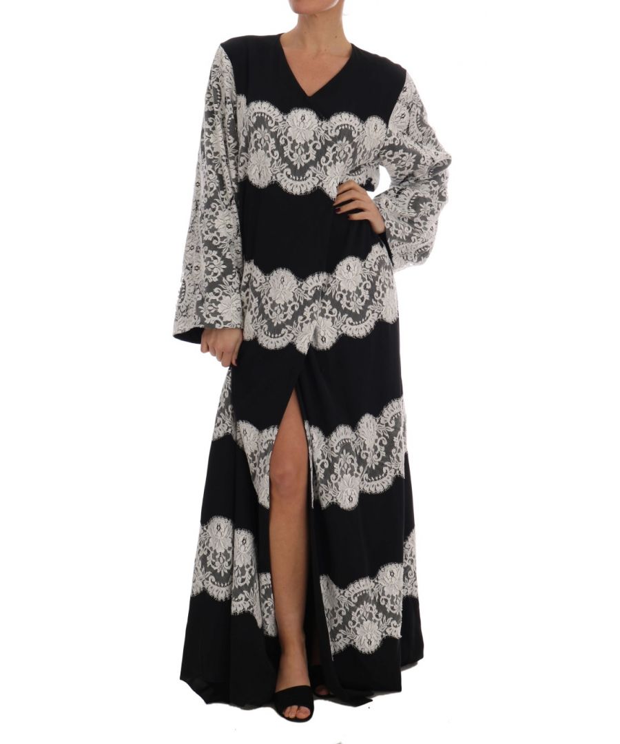 Dolce & ; Gabbana Gorgeous brand new with tags, 100% Authentic Dolce & ; Gabbana black silk with white floral lace kaftan dress Model : Cape kaftan maxi long dress Color : Black and white Floral applique Ricamo lace Silk stretch inner lining Full front button closure Logo details Made in Italy Very exclusive and high craftsmanship Material : 66% Silk, 20% Cotton, 4% Elastane (stretch), 6% PA, Lining : 96% Silk, 4% Elastane (stretch)
