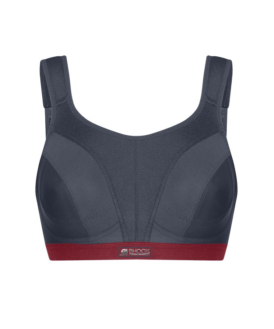 Shock Absorber Classic Support Sports Bra. Moisture-wicking with a wide underband, padded closure and adjustable, padded straps. Product is recommended hand-wash only.