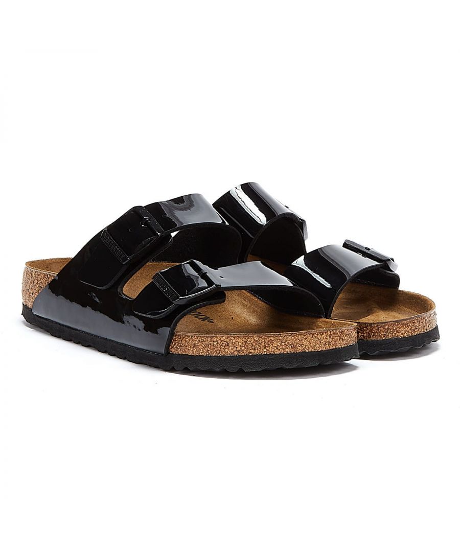 Made in Germany, Birkenstock's Arizona is an iconic silhouette for its timeless design and comfort. The adjustable two-strap design with a contoured cork footbed provides a custom fit whilst an EVA sole offers lightweight cushioning and shock absorption. This iteration features birko flor with a patent finish and soft, breathable fleece lining. \n\n- Branded buckle closures\n- Suede lined footbed