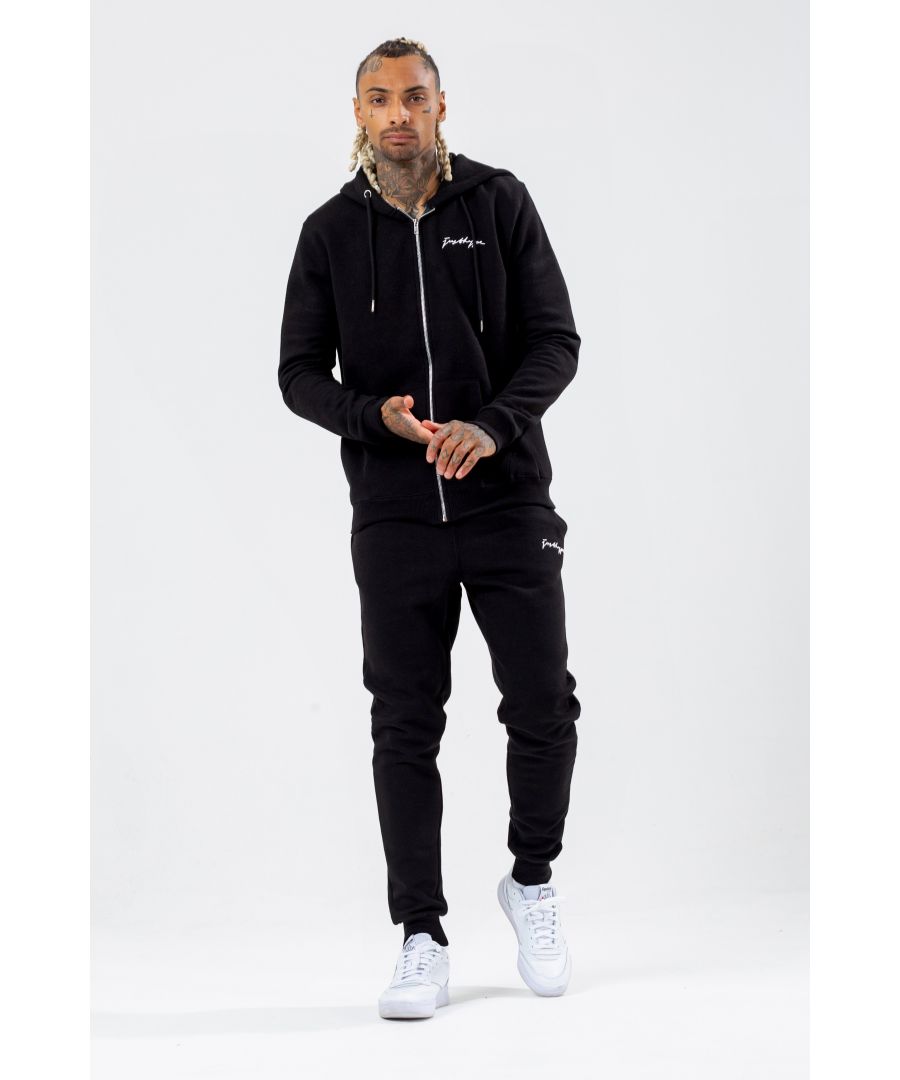 The HYPE. Men's black tracksuit set is the new go-to everyday essential. Designed in our classic zip hoodie shape, with a fixed hood and fitted hem and cuffs. Which is paired with our standard fit, ultimate comfort joggers, featuring drawstring pullers and an elasticated waistband. With a classic, on-trend black colour palette . Finished with the embroidered just hype signature logo on the front in a contrasting white. Machine washable.