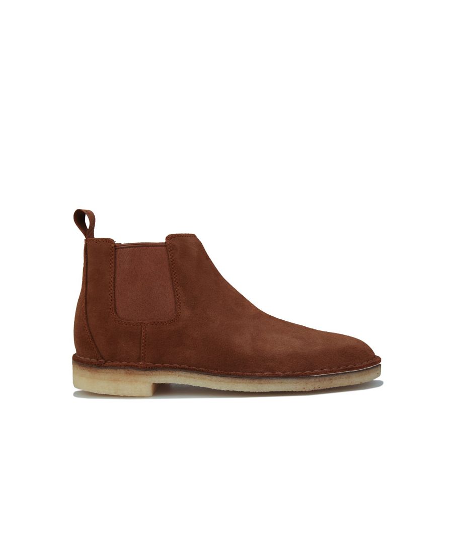 Mens Clarks Originals Desert Chelsea Boots in brown.- Premium suede leather upper.- Lace-up construction.- Leather-lined interior.- Elasticated side gusset panels.- Pull-on heel tab.- Embossed script branding to the side heel.- Cushioned moulded insole.- Leather runner board.- Traditional crepe outsole.- Tougher and thicker construction.- Care according to brand.- Leather upper  Textile lining  Synthetic sole.- Ref: 26147079