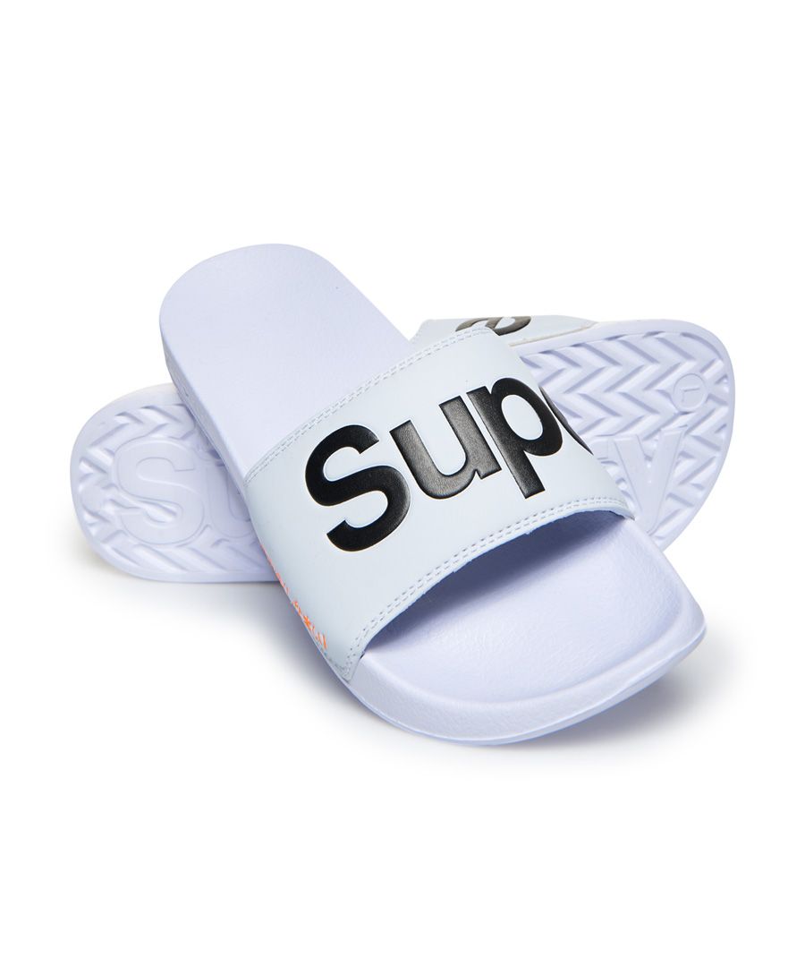 Superdry men's pool sliders. The perfect pool side slip on, these sliders feature a wide strap and moulded sole for comfort. The sliders are completed with a Superdry logo on the side of the sole and on the front of the strap.S - UK 6-7, EU 40-41, US 7-8M - UK 8-9, EU 42-43, US 9-10L - UK 10-11, EU 44-45, US 11-12XL - UK 12-13, EU 46-47, US 13-14