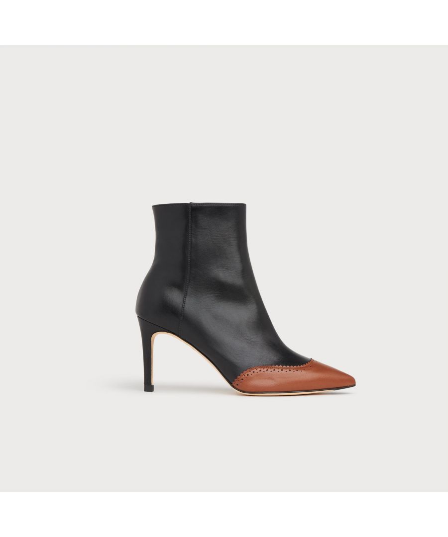 Sleek and stylish, our Angelica ankle boots tap into the season's love for toe cap detailing. Crafted in Spain from beautiful black and tan soft calf leather, they have pointed toe caps with brogue detail, inside zips and elegant stiletto heels. Wear them with  tailored trousers or sharp pencil skirts.