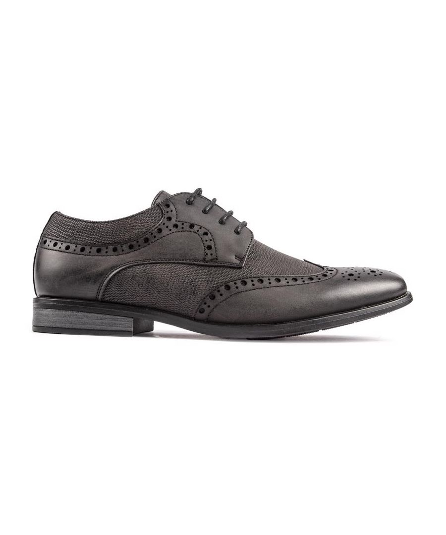Keep It Cool And Classic In These Black Burns Brogue Shoes By Soletrader. Featuring An Upper With Traditional Brogue Details Combined With Reptile Textured Details. A Lightweight Design With Sleek Blind Eyelets, This Pair Is Sure To Become Your New Go-to Shoe.