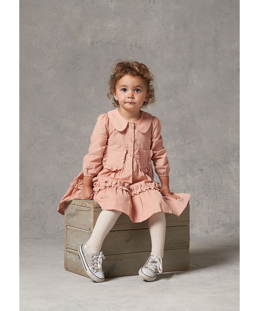 We love this! Super soft needle cord tiered dress with peterpan collar  sweet patch pockets and and a half placket for easy dressing.    Angel & Rocket cares - Made with fairtrade cotton   Pink   About me: 100% cotton   Look after me: Think planet - wash at 30c
