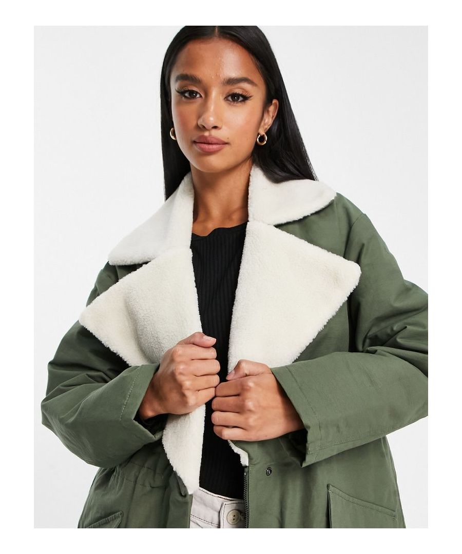 Coats & Jackets by ASOS Petite Throw on, go out Contrast borg collar Zip and press-stud fastening Pocket details Drawstring hem Regular fit Sold by Asos