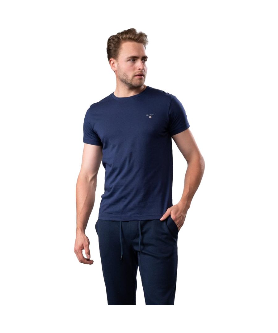 These Original Mens Designer Gant T-Shirts feature the brands classic Logo and a Crew Neckline. Crafted With 100% Cotton, these Lightweight and breathable Regular Fit T-shirts are Machine Washable.