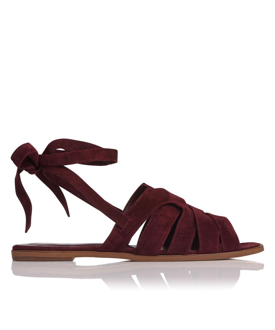 Summer sandals don’t get chicer than Selma. This off-duty flat features overlapping straps and a brushed suede finish. The elegant ankle tie promises extra support and a comfortable fit. Slip these sandals on during summer outings in the city with a white linen shirt dress and oversized sunglasses.