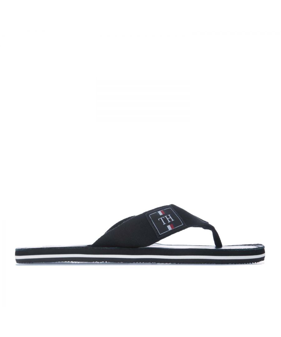 Mens Tommy Hilfiger Elevated Leather Sandal in black.- Synthetic upper.- Slip on closure.- Secure strap fastening.- Branded toe thong.- Branding to the sole and insole.- Tommy Hilfiger branding to footbed.- EVA sole.- Synthetic Upper  Textile Lining  Synthetic Sole.- Ref.: FM0FM02692BDS