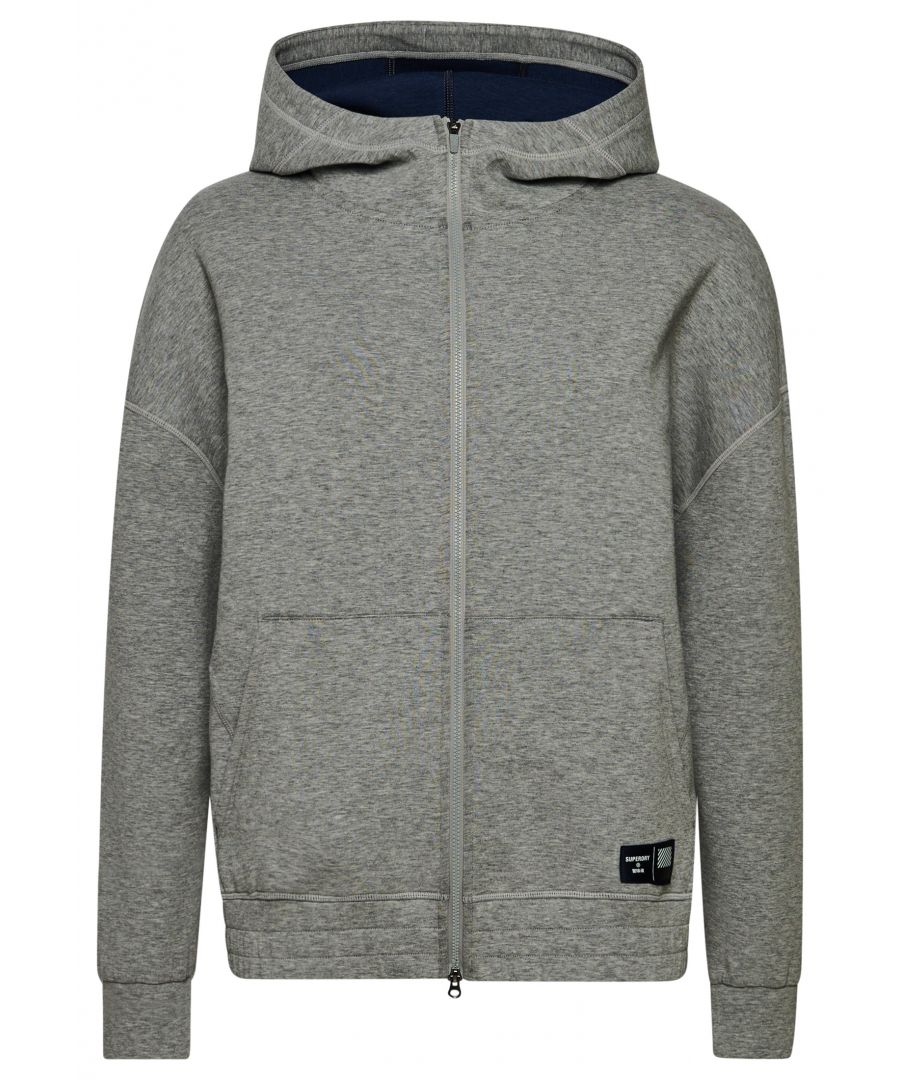 Soft to touch, this Train Gymtech Zip Hoodie will keep you warm and comfortable when you train, allowing you to push yourself all year round. With a relaxed fit and dropped armholes, you'll have room to move without constraints.Relaxed: A classic fit. Not too slim, not too tight – no distractions hereBreathable fabric - Allows air and moisture to pass through the material to help keep you comfortableMoisture-wicking - Helps to regulate your body temperature by drawing perspiration away from the body and allowing moisture to disperse from the outer face of the fabricMain zip fasteningDropped armholesDouble pockets - Inner zip pockets inserted into kangaroo front pocketsRibbed cuffsElasticated hemClassic Superdry logo patch