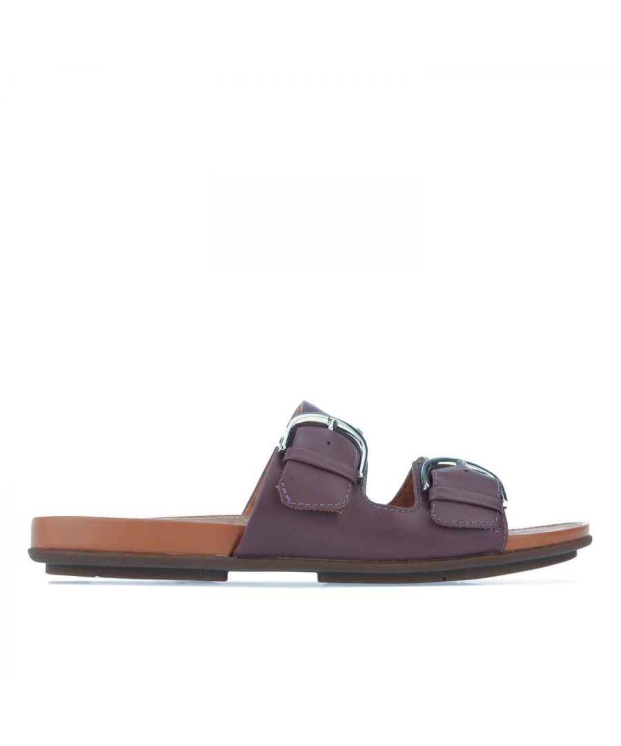 Womens Fit Flop Gracie Leather Slide Sandals in purple.- Leather upper.- Slip on closure.- Adjustable buckle.- High-rebound Dynamicush™ cushioning.- Rubber sole.- Leather upper  Leather lining.- Ref.: DE3889