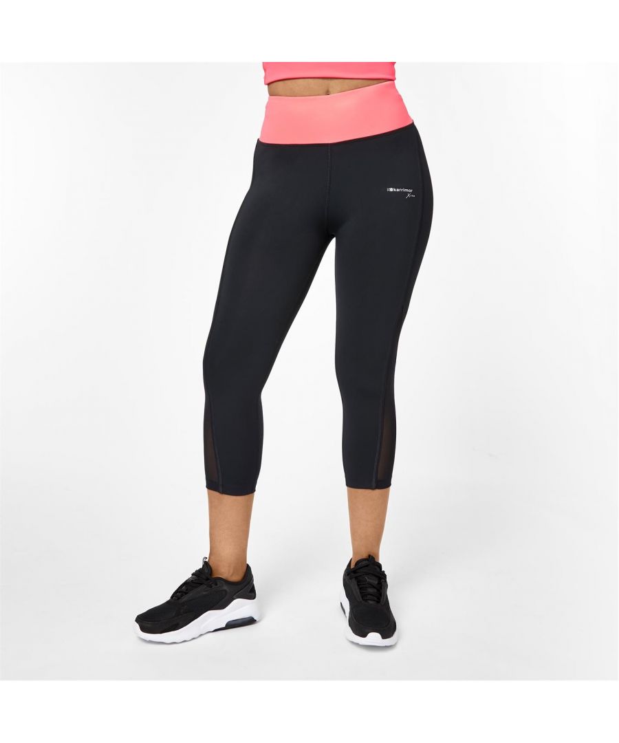 Karrimor T Capris Ladies Conquer your next workout with the T Capri Tights from Karrimor. Crafted with a wide elasticated waistband with an internal drawstring, these cropped breathable bottoms are perfect for training. Design is finished with a zipped back pocket and Karrimor branding. > This product may have slight cosmetic differences from the image shown due to assorted colours or updated seasonal collections. > Ladies running capris > Wide elasticated waistband > Internal drawstring > Breathable > Sweat-wicking > Zipped back pocket > Karrimor branding > 80% polyester, 20% elastane > Machine washable