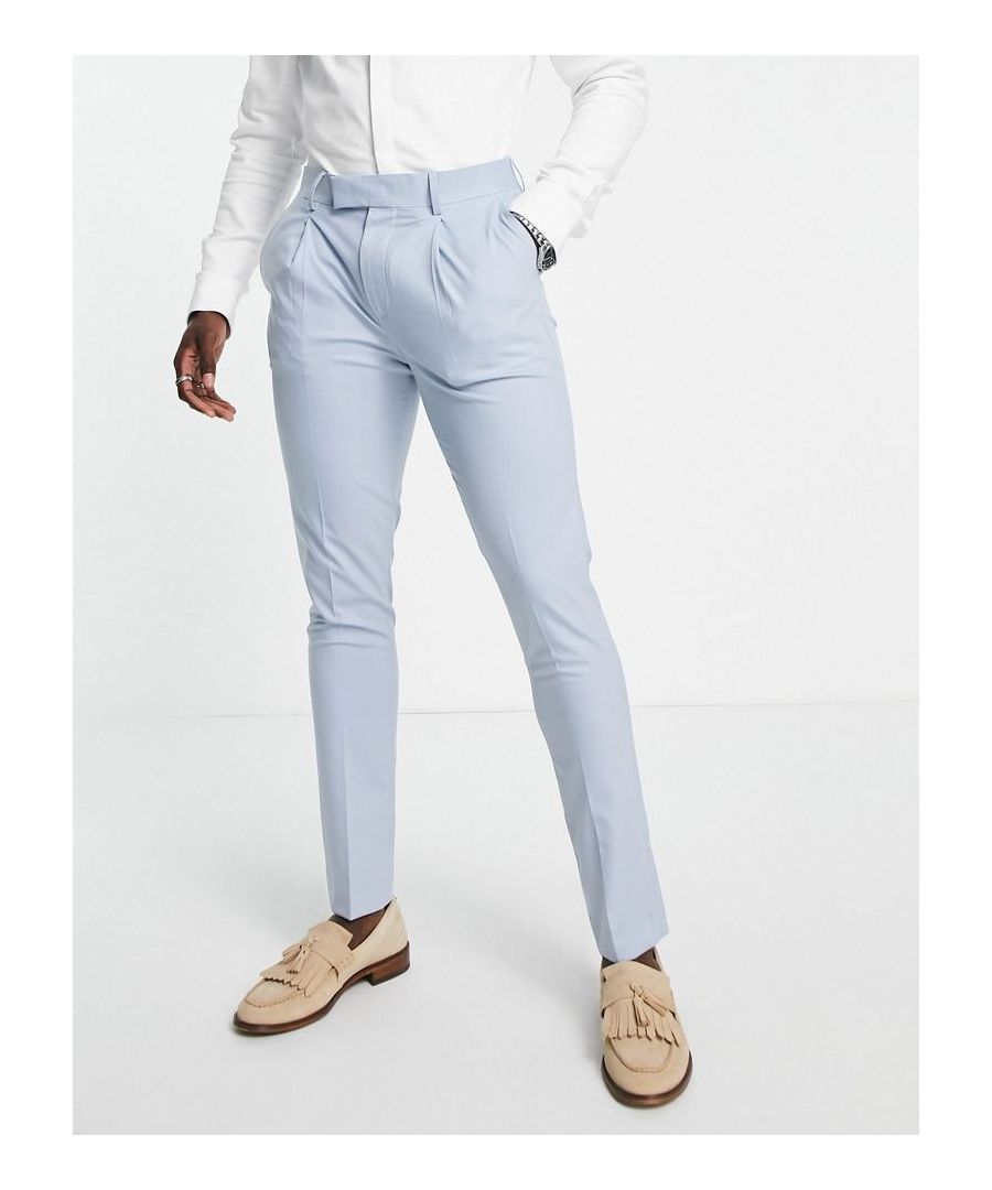 Suit trousers by Noak Effort: made Regular rise Belt loops Internal pocket to waistband Side pockets Faux-back pockets Stab-stitching Super-skinny fit Sold by Asos