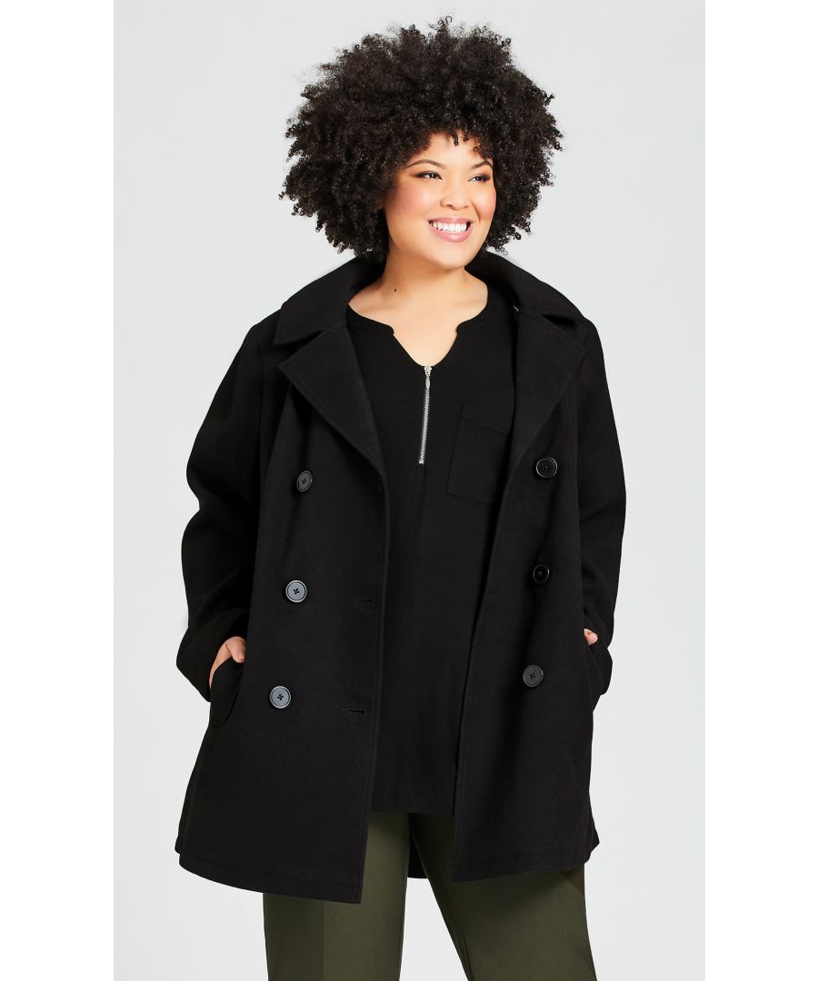 Staying warm has never looked so good! The Faux Wool Peacoat mixes style and comfort with the removable button hood in a charming double breasted silhouette, perfect for heading into the colder months. Key Features Include: - Lapel collar neckline - Full length sleeves - Double breasted button closure - Functional slash front pockets - Button removable hood - Partially lined - Faux wool finish - Hip length longline hemline
