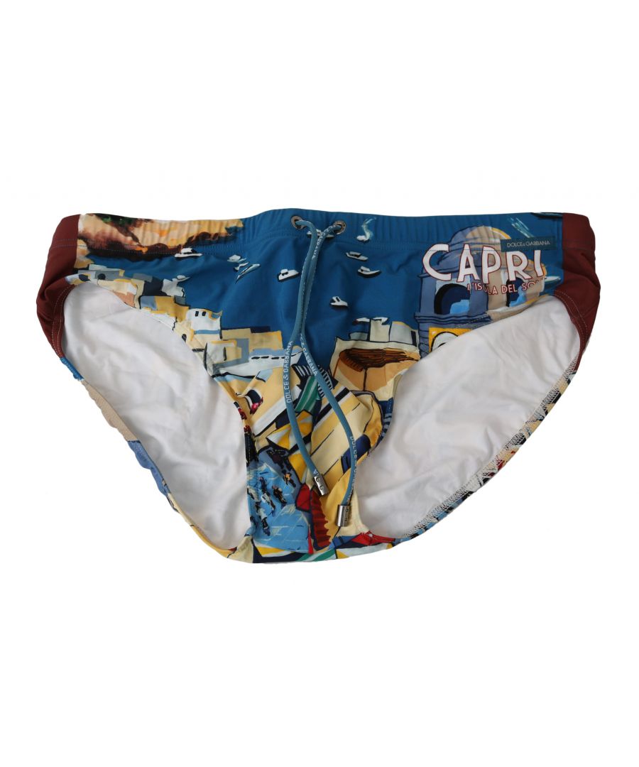DOLCE&GABBANA. \nAbsolutely stunning, 100% Authentic, brand new with tags Dolce&Gabbana Beachwear. . \nModell: Swim briefs beachwear \nColor: Blue with CAPRI print \nMaterial: . 75% Nylon 25% Elastane\nWaist strap. \nLogo details. \nGreat fitting and comfort.