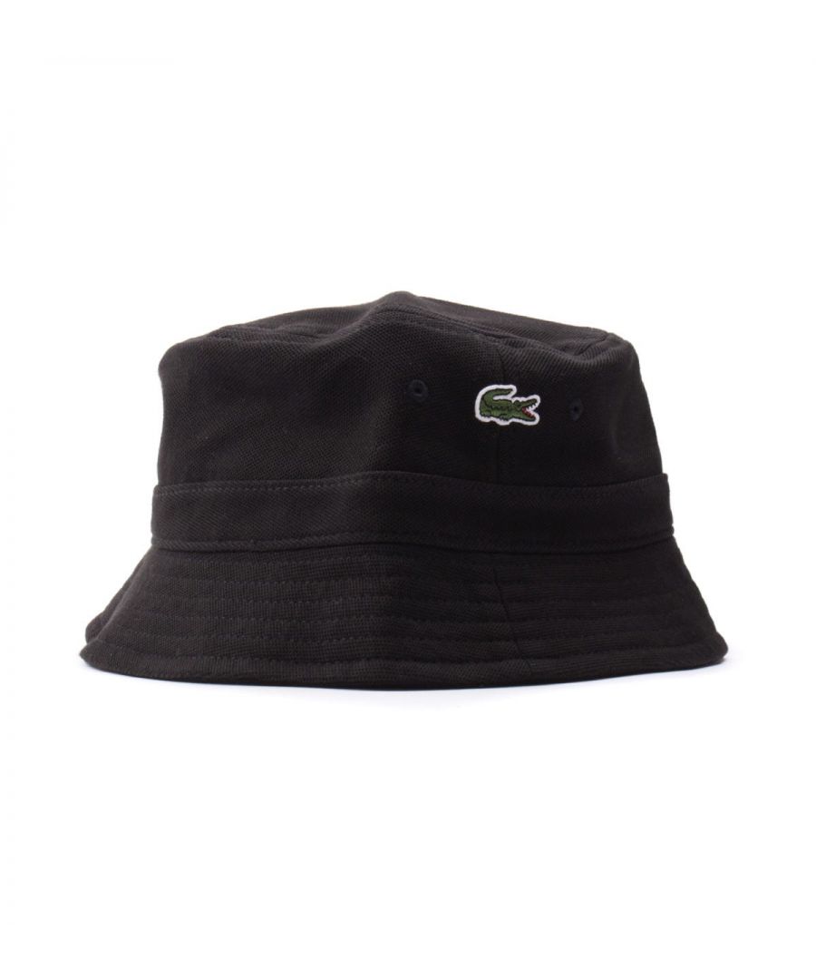 Spice up your urban looks with the bob bucket hat from Lacoste offering a 90\'s inspired finish to any casual outfit this season. Crafted from pure organic cotton pique with tone on tone overstitch detailing and breathable eyelets for a comfortable day long wear.  Finished with the iconic embroidered green crocodile to the side. One Size, Pure Organic Cotton Pique, Breathable Eyelets, Decorative Overstitching, Lacoste Branding.