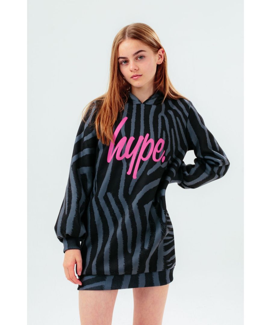 The cutest dress you'll need this season, and every season after that. The HYPE. Black Tonal Zebra Hoodie Dress features an animal print 100% polyester fabric base for the upmost comfort. With a crew neckline and long sleeves in our unisex kids sweat dress shape. Finished with the iconic Hype. script logo in a contrasting pink across the front. Wear with a pair of sneakers to complete the look. Machine wash at 30 degrees.