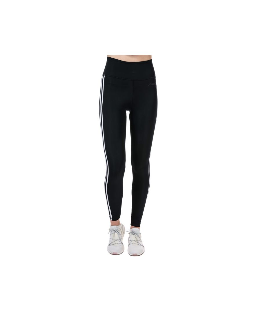 Womens adidas Designed 2 Move 3-Stripes High-Rise Long Tights in black - white.- Key pocket inside elastic waist.- High rise.- Moisture-absorbing AEROREADY.- Long length.- Tight fit.- 70% Recycled polyester  19% Polyester  11% Elastane. Machine washable.- Ref: DU2040