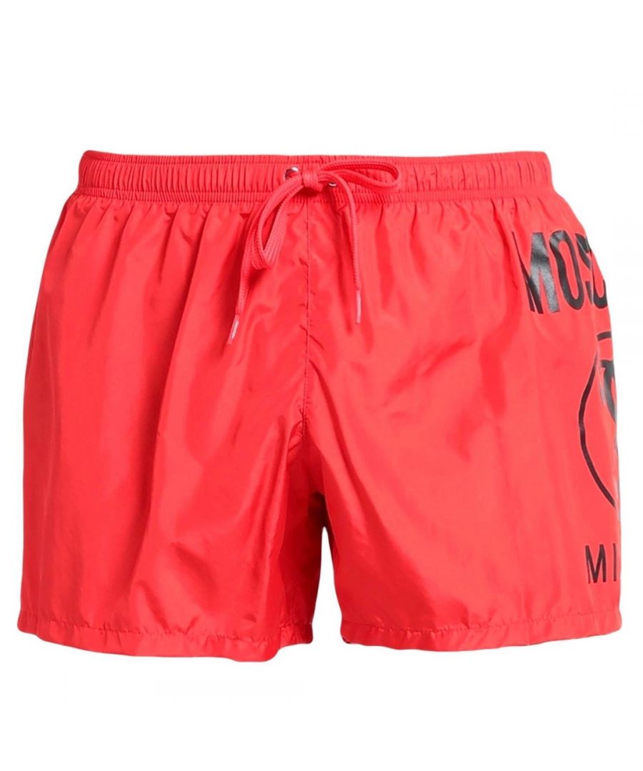 Moschino Milano Logo Red Swim Shorts. Moschino Red Swim Shorts. Elasticated Waistband, Drawstrings. 100% Polyester, Made In Italy. Moschino Milano Logo. Product Code -  A6103 5989 0113