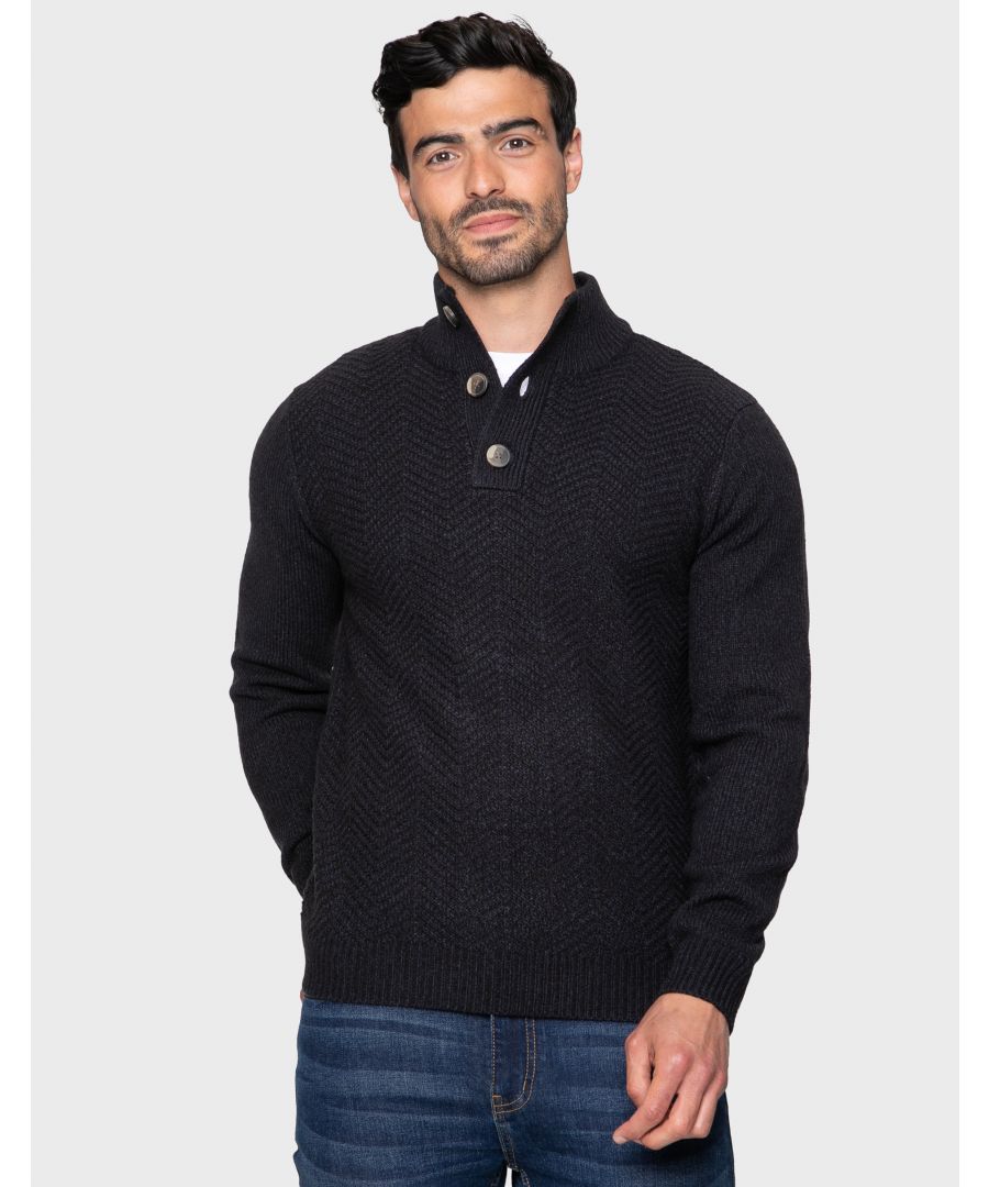 This medium weight, textured knit jumper from Threadbare features a button up, ribbed funnel neck collar with ribbed cuffs and hem. Made in a soft yarn for comfort, this is a great piece to keep you warm this season. Other colours available.