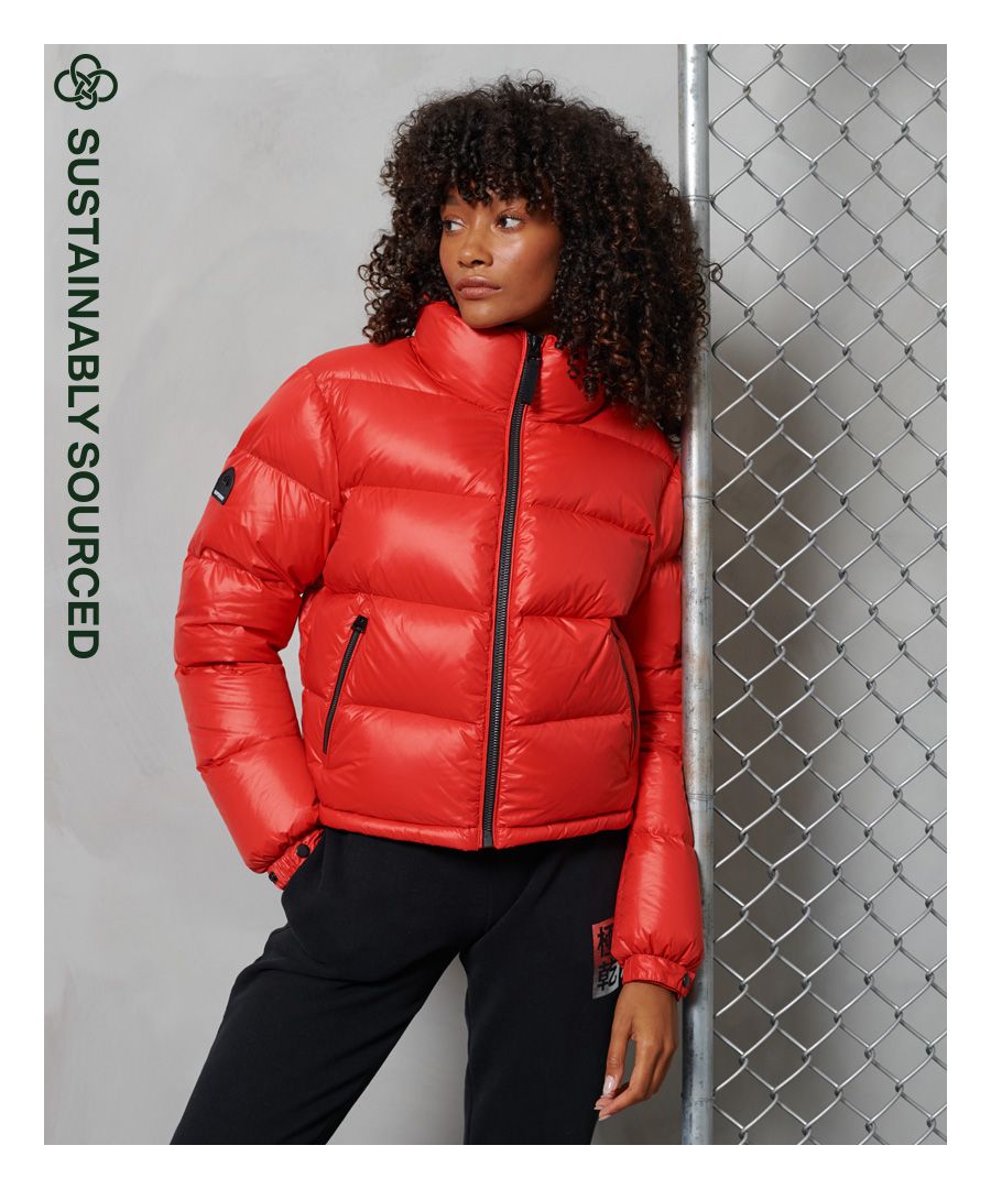 Stay warm in style this season. This padded jacket has been filled with a 90/10 down filling for extra comfort and warmth. Available in a variety of colours so that you can pick which one best suits your style.Main zip fastening90/10 down fillingTwo pocket designBungee cord hemElasticated popper cuffsSignature logo badgeSuperdry is certified by the Responsible Down Standard to confirm that our down filled products are sourced to ensure animal welfare.