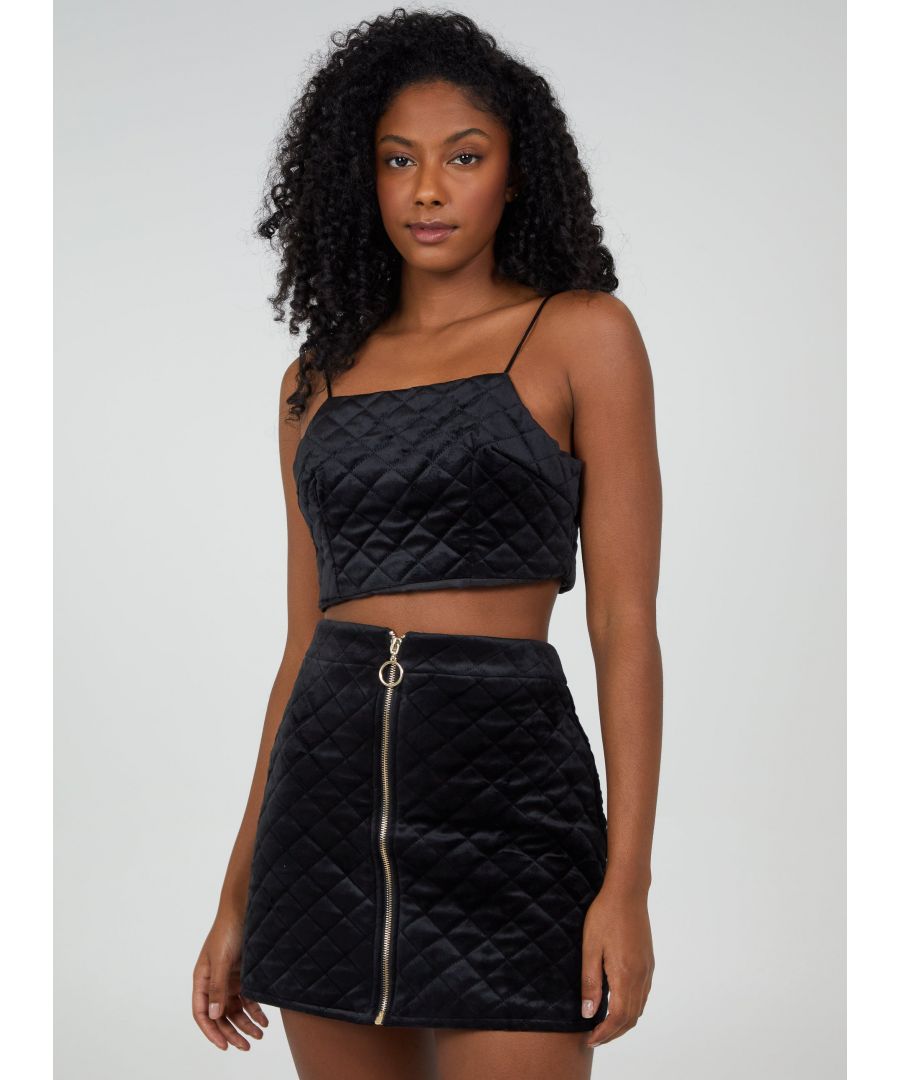 Here's a chic, trendy cami to be worn this season. Team with the Cheeky I mini skirt and steal the show. Composition: 100% Polyester. Hand Wash. Dry Flat. Do Not Iron. Reshape Damp.