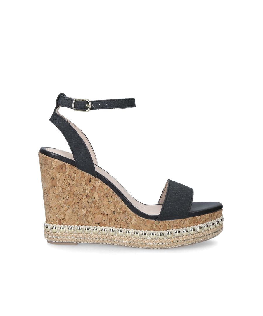 Every wedding-guest wardrobe needs a go-to wedge and Pip by Miss KG has you well and truly covered. Styled with black straps, this cork 95mm-heeled sandal features studs around the sole for a contemporary twist.