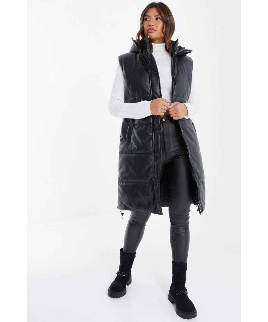- Faux leather  - Hood detail  - Front pockets  - Padded  - Length: 140cm approx  - Model height: 5' 8