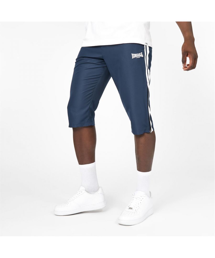 Lonsdale Stripe Three Quarter Pants - Keep things casual with these Lonsdale Stripe Three Quarter Pants Constructed from a soft cotton-blend for a comfortable wear, these are crafted with an elasticated waistband with drawstring fastening for a secure and personalised fit. Designed with a cut out length - making them perfect for workouts in the summer months! The piece is complete with Lonsdale branding for a sporty look.