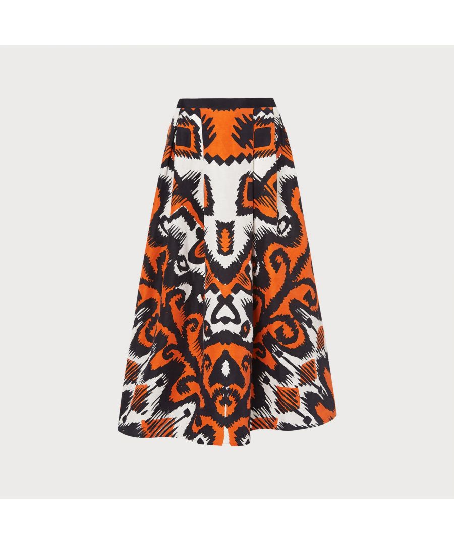 Crafted in exquisite linen silk, and treated to an eye-catching Aztec-inspired print, the Andrea skirt is a standout separate for the summer season. Midi in length with pleat detail and a feminine silhouette, pair with a simple white tee or a cami. Finish with strappy espadrilles and you're holiday-ready.