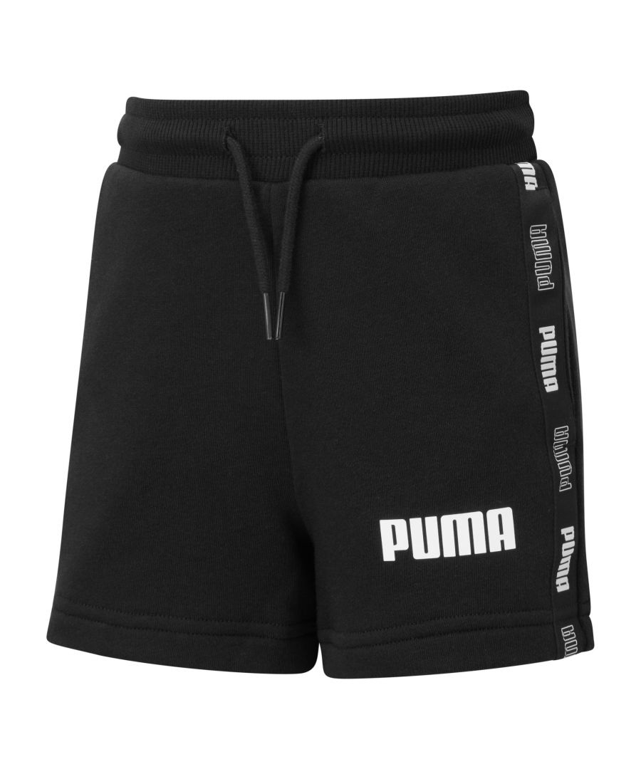 Athletic PUMA DNA meets comfy, casual style. Older kids can throw on the Tape Shorts in French terry and conquer the day the comfortable way. FEATURES & BENEFITS Recycled Content: Made with at least 20% recycled material as a step toward a better future DETAILS Regular fitAbove knee lengthPUMA branding detailsSignature PUMA design elements