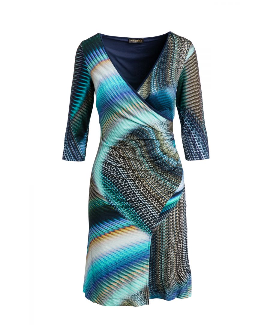 Faux wrap dress in print stretch jersey fabric – viscose-elastane.  ¾ sleeves. Double fabric in the front. Black trim at the neckline. Slightly gathered on the left at the waist. Stretch fabric lining in the back.