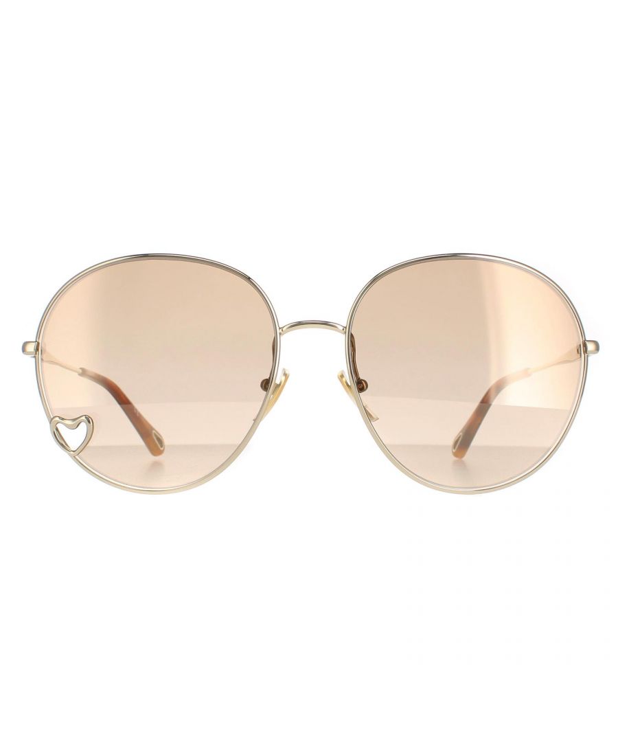 Chloe Round Womens Gold Brown Light Gold Mirror  CH0027S  Sunglasses are a gorgeous round style crafted from lightweight metal. The silicone nose pads ensure all day comfort while Chloe's logo features on the inside of the temples tips for authenticity.