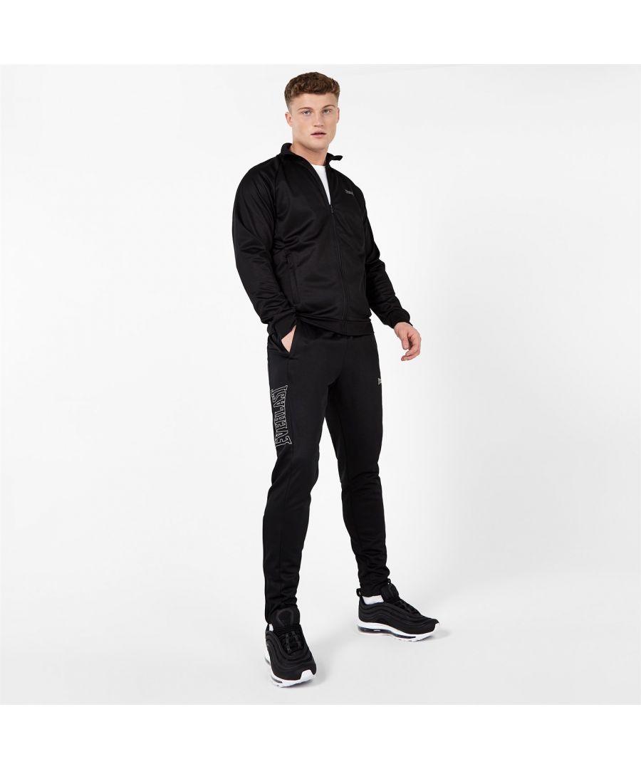This Everlast track joggers are such an essential, whatever the season. Made to help you get your best game on, these are a pair that go with everything (especially matching essential track top for a must-have tracksuit). These jogging bottoms also wick sweat away from the skin so you can stay comfortable before, during and after your workout. > Slim fit > Sweat wicking > New style > Printed branding at leg > Zips at hem > 100% Polyester > Machine washable