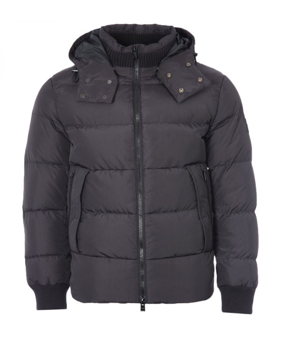 This modern down jacket from BOSS is the perfect way to elevate your outerwear and stay warm. Crafted from a water-repellent recycled polyester shell with premium duck-down insulation. Featuring a rib-knit stand-up collar with a detachable drawcord hood, two-way zip closure, rib-knit cuffs and dual entry front pockets. Finished with subtle BOSS branding and iconic rubberised logo badge at the left sleeve. Regular Fit, Water Repellent Recycled Polyester Shell, Duck Down Insulation, Detachable Drawcord Hood, Ribbed Stand Up Collar, Two-Way Zip Closure, Internal Zip Pocket, Rib-Knit Cuffs, Adjustable Drawcord Hem, BOSS Branding. Style & Fit: Regular Fit, Fits True to Size. Composition & Care: Shell: 100% Recycled Polyester (Nylon), Fill: 70% Duck Down & 30% Duck Feathers, Professional Wet Wash.