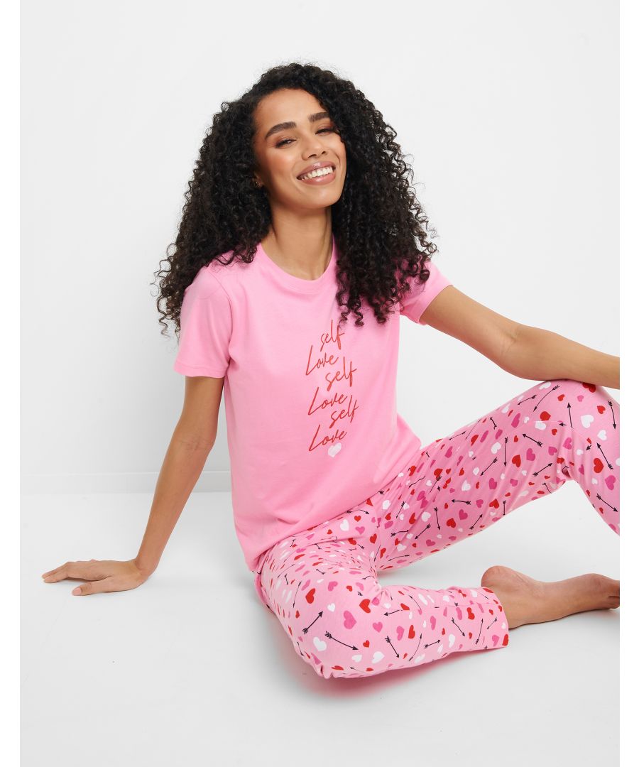 This adorable pyjama set from Threadbare features a short sleeve top and long cuffed bottoms. Made from soft cotton for a comfortable feel and easy washing. The top has a front print and the tapered bottoms features an all-over print and elasticated waistband with contrasting drawcord. Other styles are available.