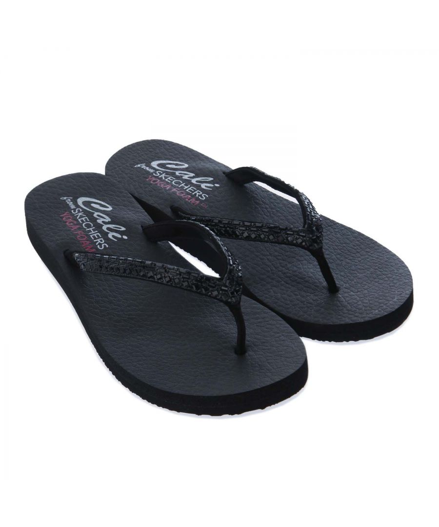Womens Skechers Meditation Shine Away Sandals in black.- Soft smooth nubuck-textured synthetic upper.- Slip on closure.- Thong straps with sparkling rhinestone designs.- Rhinestones feature matching or contrast colored designs.- Baguette  square and round sparkling rhinestone looks for fun shining detail.- Soft fabric toe post.- Soft fabric strap lining.- YOGA FOAM® cushioned comfort footbed.- Lightweight flexible midsole.- 1 -2 inch flat heel.- Flexible traction outsole.- Synthetic upper  Synthetic lining and sole.- Ref.: 32918BBK